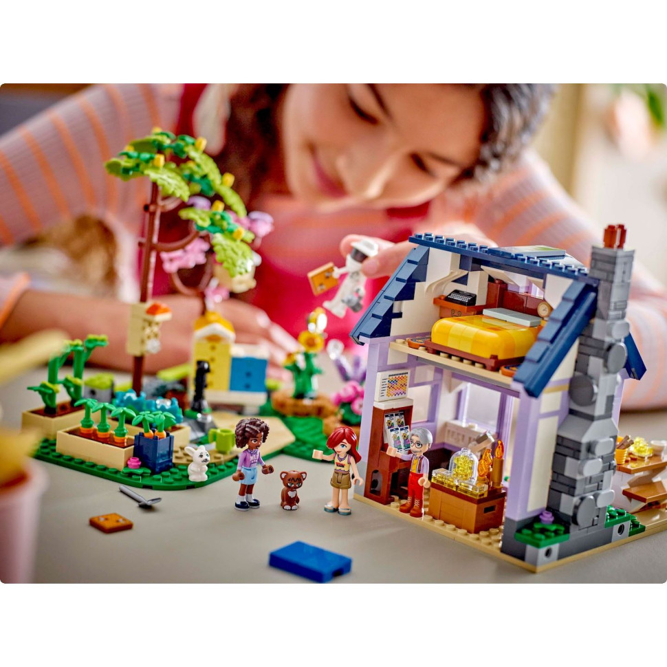 Конструктор LEGO Friends Будиночок і квітник бджолярів 42669, 1161 деталь