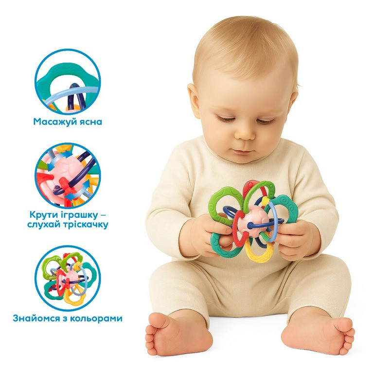 Розвивальна іграшка-прорізувач