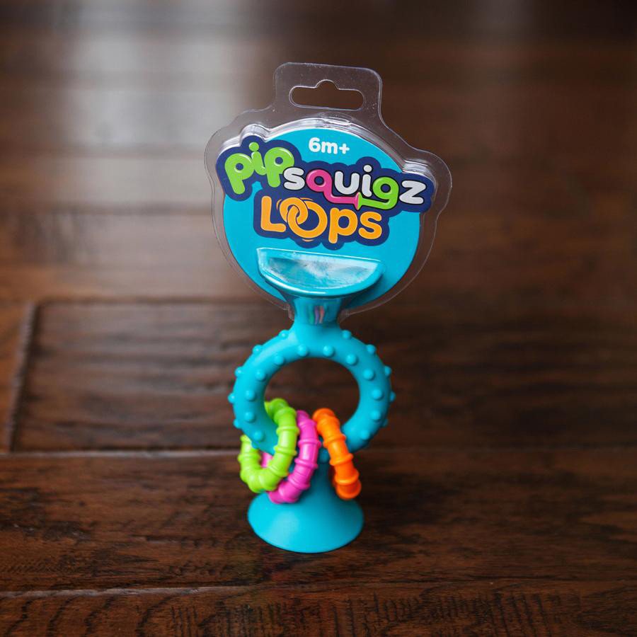 Прорезыватель-погремушка pipSquigz Loops Fat Brain Toys FA166-1 на присосках, бирюзовый